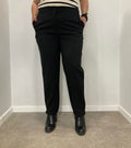 Black cigarette trousers