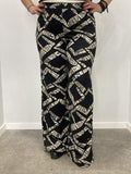 Knitted trousers with geometric patterns