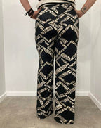Knitted trousers with geometric patterns